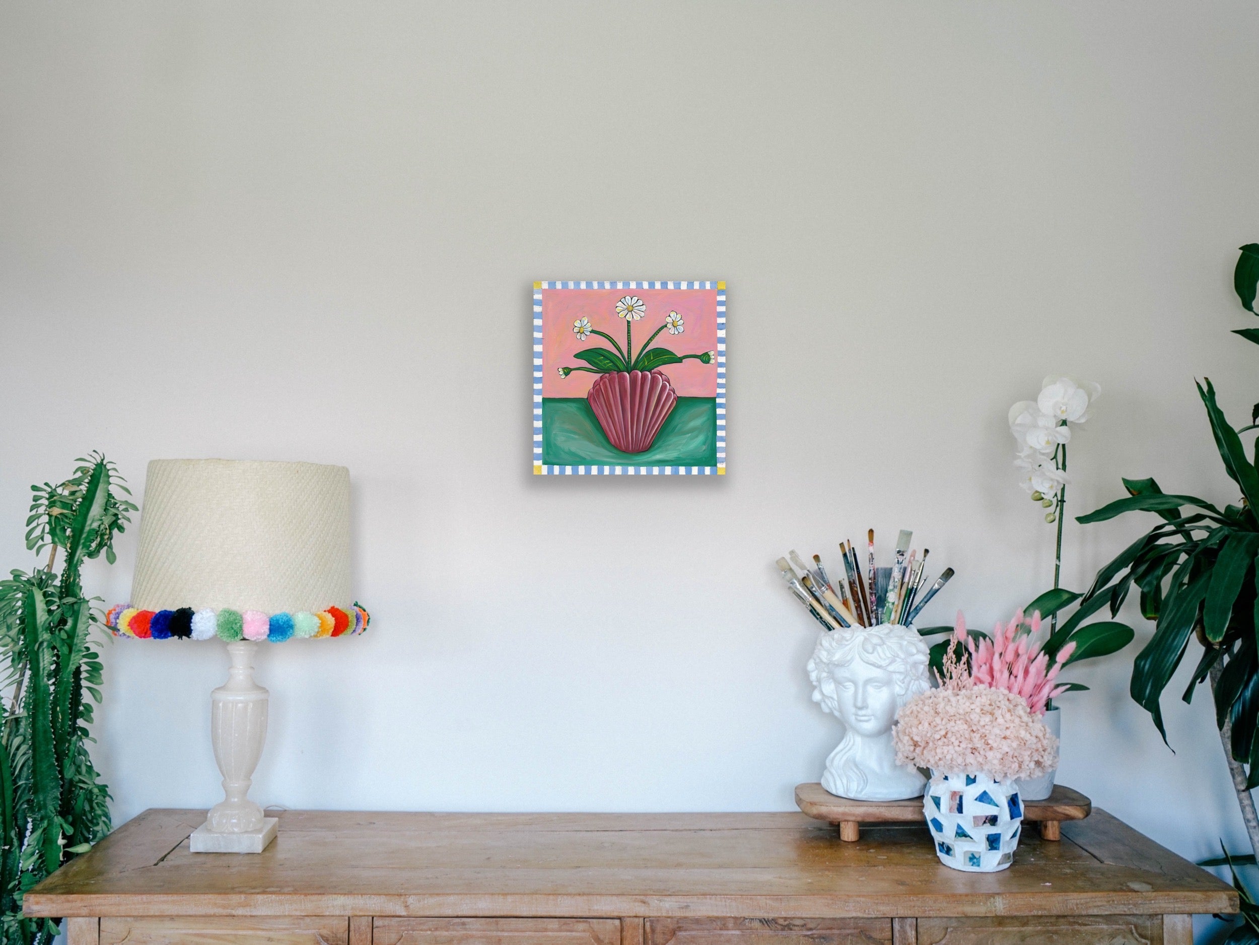 Daisies in Shell Vase